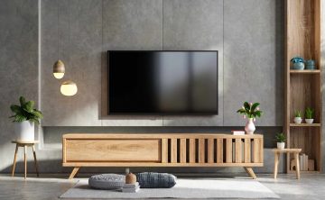 Loft style in tv room interior wall mockup on concrete wall,3d rendering